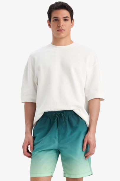 شورت سباحة فوق الركبة قصة مستقيمة ببطانة شبكية