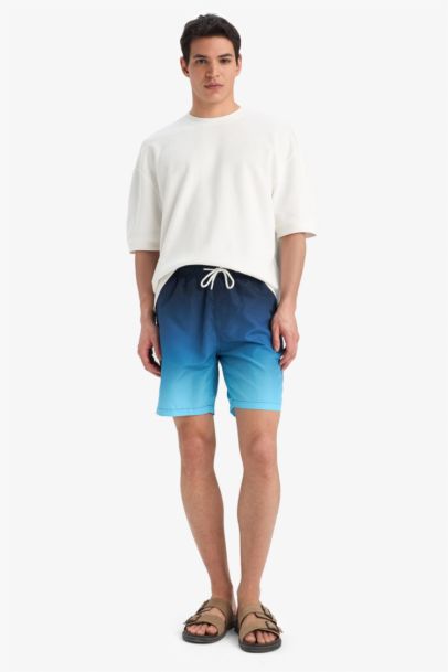 Short de bain au-dessus du genou avec doublure en filet Coupe régulière