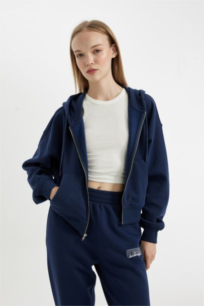 Sweat à capuche bleu marine zippé avec poche kangourou