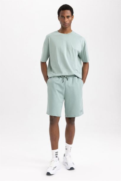 تي شيرت نص ردن اوفر سايز مطبوع بياخة مستديرة من DeFactoFit