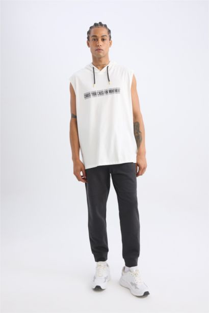 تانك توب سليم فيت بكابيشون بيج فاتح من DeFactoFit