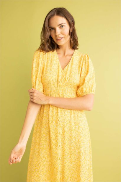 فستان ميدي بأكمام بالون وياقة V