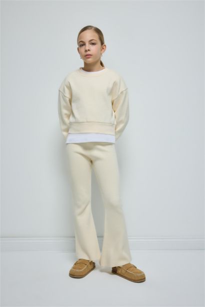 بنطلون تريكو بناتي فلير فيت بيج فاتح