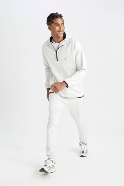 بنطلون جوجر قماش سكوبا سليم فيت بأستك من تحت من DeFactoFit