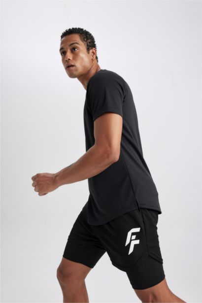 شورت محكم سليم فيت بجيب من DeFactoFit