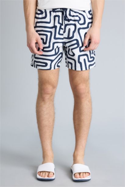 Short de bain court imprimé avec doublure en filet