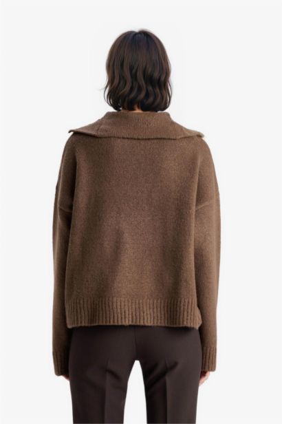 بلوز تريكو اوفر سايز بياخة بولو بنص سحاب