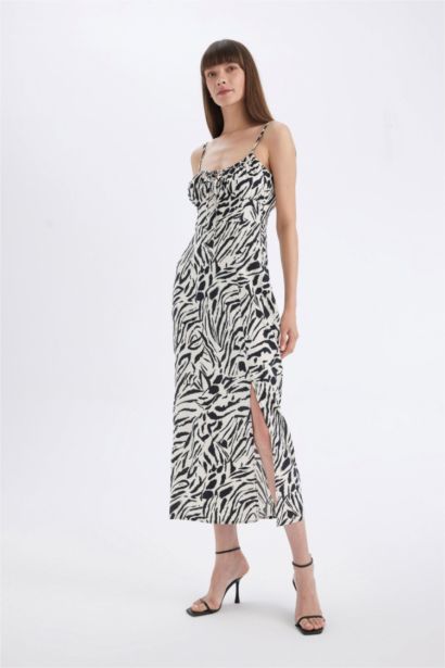 فستان طويل زيبرا مطبوع فيسكوز بقصة A وياخة قلب