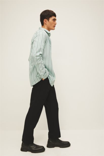 قميص بولو مخطط كم طويل مودرن فيت