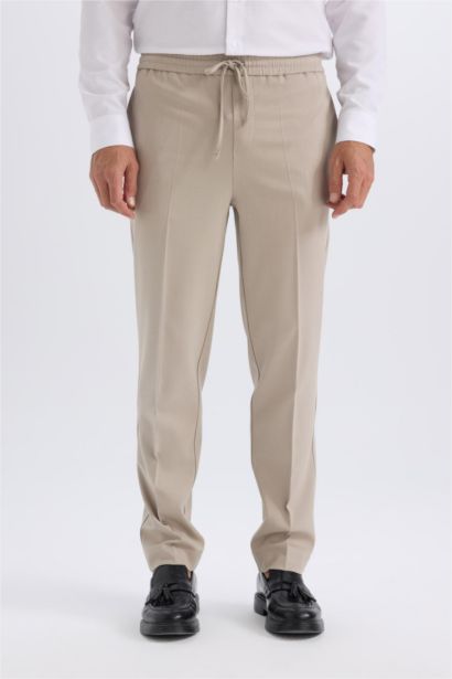 بنطلون جوجر صيفي برجل عادية بأستك من تحت