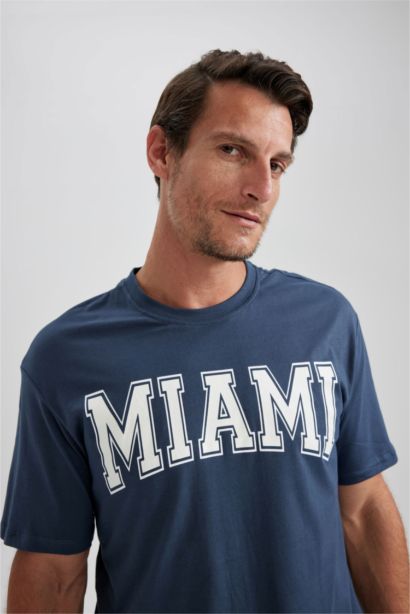 تي شيرت نص ردن بياخة مستديرة وقصة عادية