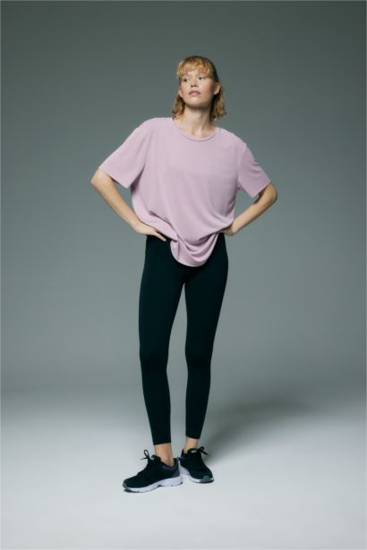 تي شيرت رياضي اوفر سايز قصة عادية