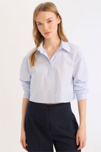 قميص كم طويل وقصة عادية