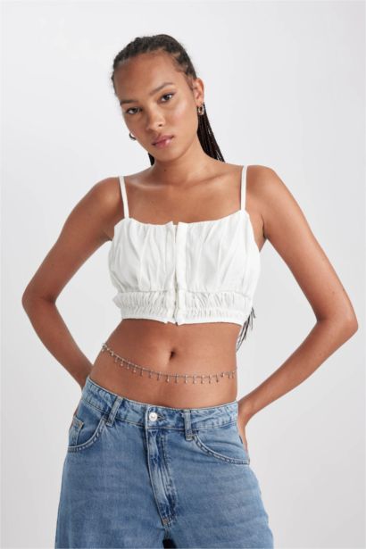 بلوزة كروب بحمالات وياخة V