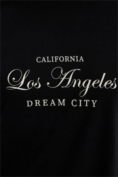 تونيك كم طويل بطبعة شعار قصة عادية