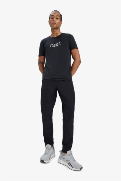 Esnek Kumaş Sporcu Jogger Eşofman Altı Slim Fit Dar Kesim Dokuma Üç Cepli Fermuarlı Paça