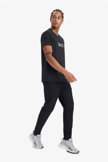 Esnek Kumaş Sporcu Jogger Eşofman Altı Slim Fit Dar Kesim Dokuma Üç Cepli Fermuarlı Paça
