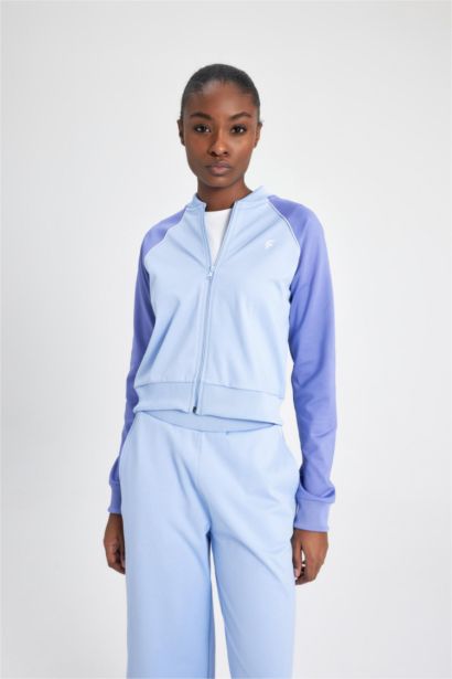 سويتر بيكة قصة عادية بجيب مزدوج من DeFactoFit