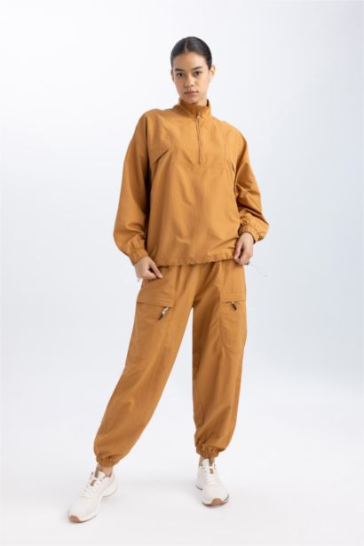 بنطلون بجامة رياضي منسوج قصة فضفاضة بجيب من DeFactoFit