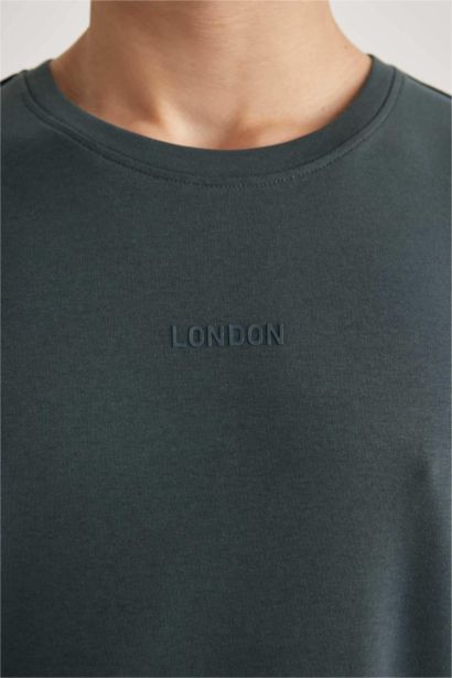 تيشيرت مطبوع قصة مريحة بياخة مستديرة