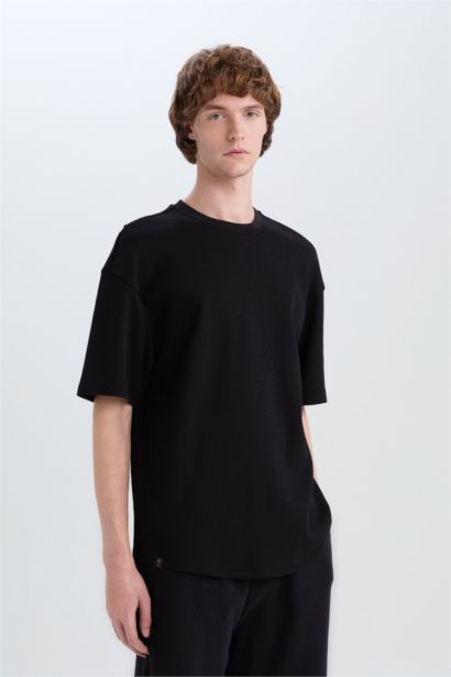 تيشيرت بيزك اوفر سايز وافل برقبة مستديرة