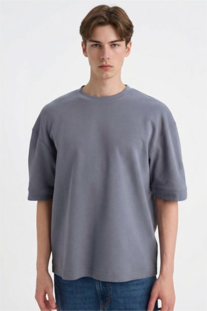 تيشيرت نص كم قصة فضفاضة قماش يسمح بمرور الهواء