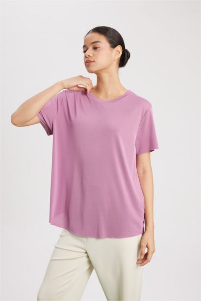 تي شيرت رياضي بريميوم اوفر سايز بياقة مستديرة من DeFactoFit