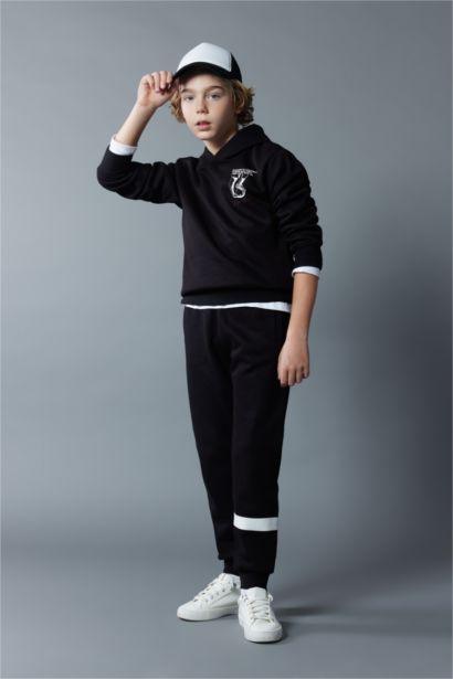 بنطلون سويت بانتس اولادي تقيل قصة عادية بأستك من تحت