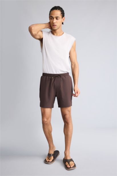 Пляжные шорты из эластичной ткани