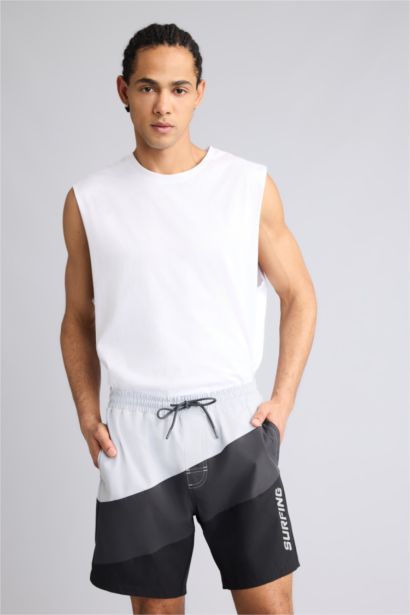 شورت بحر قصير قصة عادية محكم من DeFactoFit