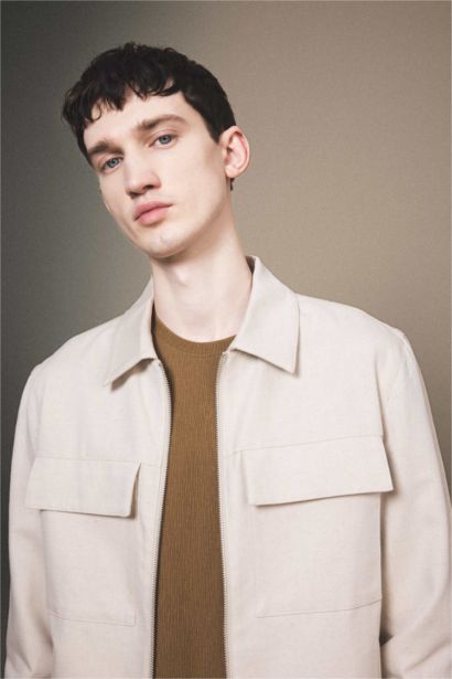 جاكيت قصة عادية برقبة بولو بنصف بطانة