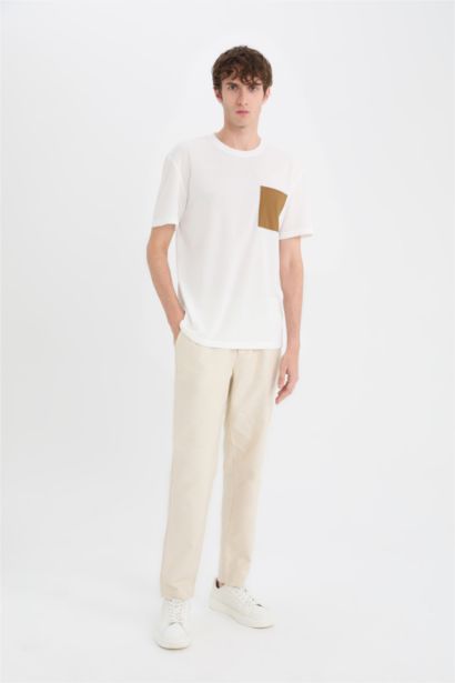 تيشيرت نص كم قصة عادية برقبة مستديرة وجيب