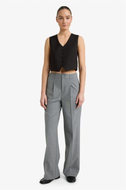 Gilet noir à boutons