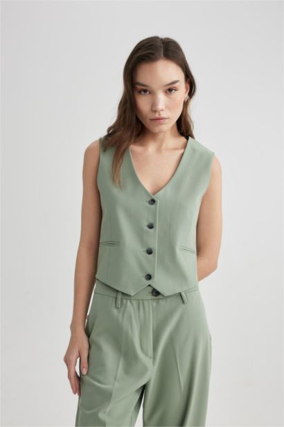 қалыпты пішім Жилет