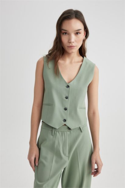 қалыпты пішім Жилет