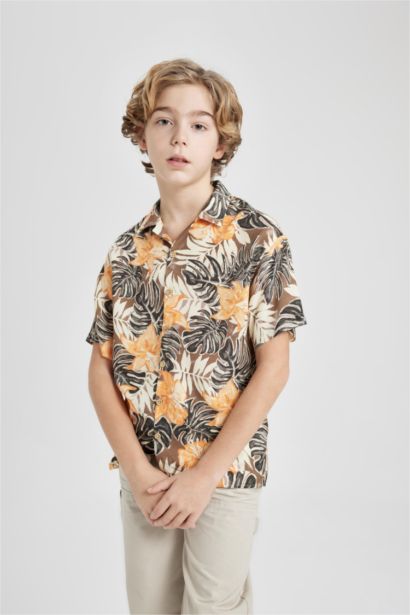 قميص بولو اولادي نص كم فيسكوز اوفر سايز