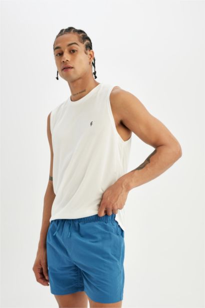 Short de bain avec doublure en filet