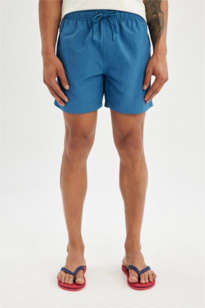 Short de bain avec doublure en filet