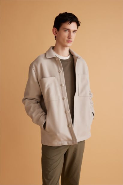 قميص قصة مريحة بياخة بولو بجيب ذو مظهر صوفي