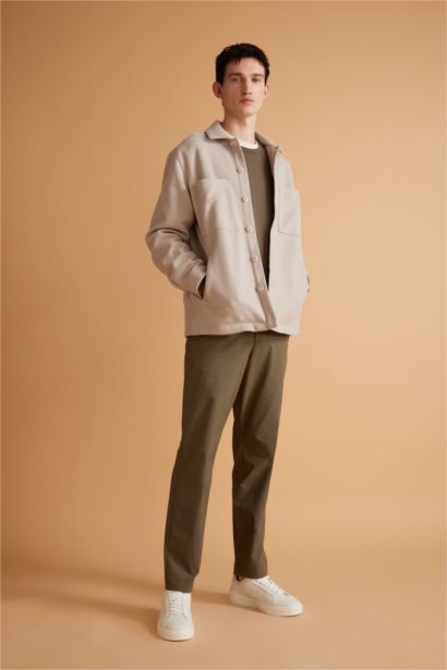 قميص قصة مريحة بياخة بولو بجيب ذو مظهر صوفي