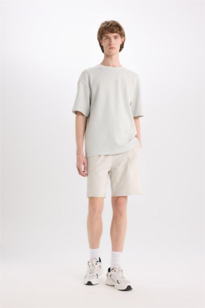 شورت سادة بيزك قطن سليم فيت بجيب