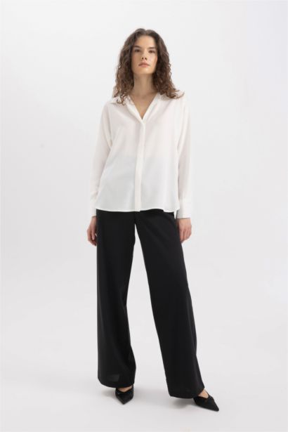 قميص كم طويل قماش ايوسل قصة فضفاضة