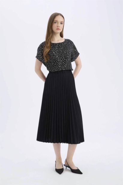 Jupe midi basique plissée à taille élastique