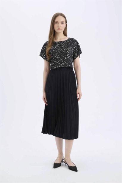 Jupe midi basique plissée à taille élastique