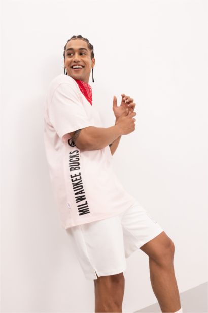 تيشيرت أوفر سايز برقبة مستديرة