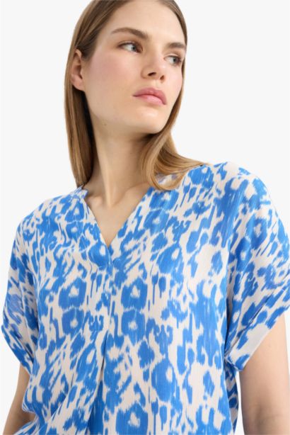 بلوزة كرنكيل نص ردن مطبوع قصة عادية