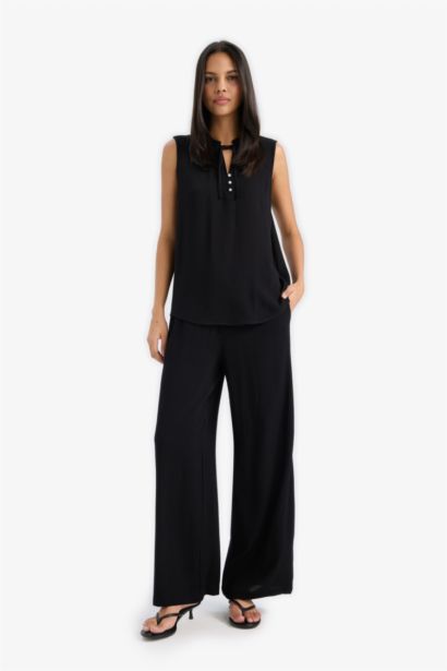 بلوزة كت قماش كرنكيل قصة عادية