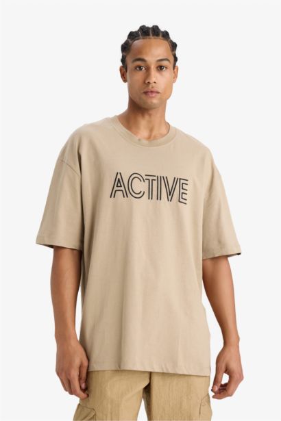 Oversize Geniş Kalıp Bisiklet Yaka Nakışlı Kısa Kollu Tişört