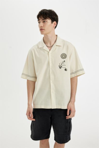 قميص قطن مطرز قصة مريحة بياخة عالية