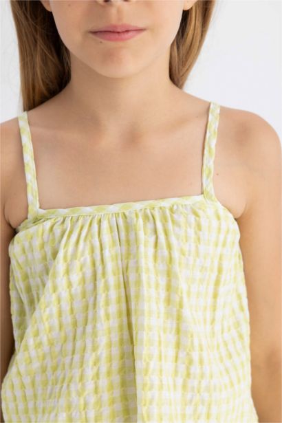 بلوزة بناتي كاروهات بحمالات أصفر